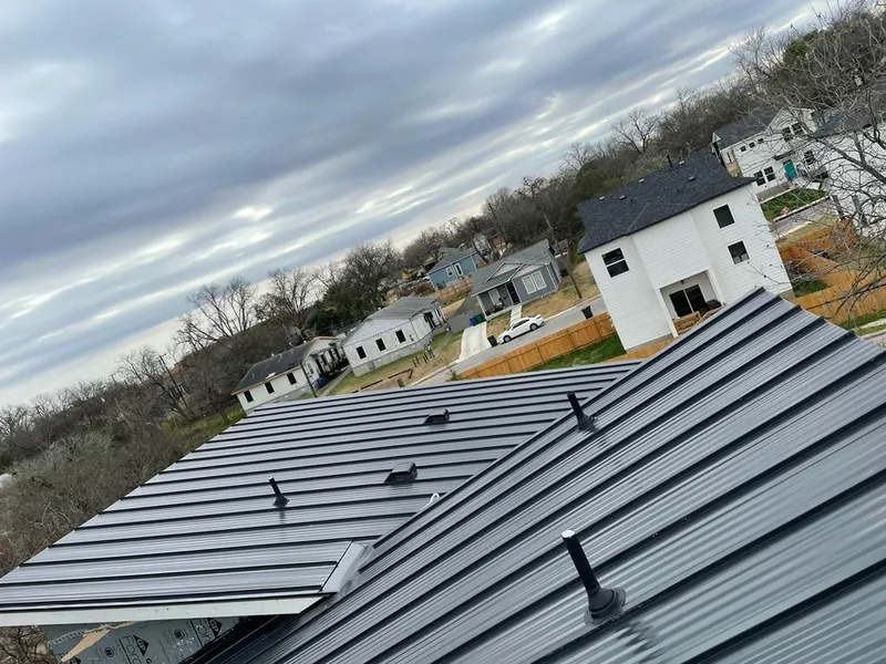 Standing seam metal roof panels with vents for Skylight Repair in Butler